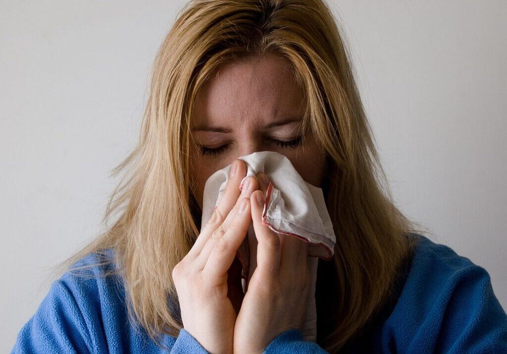 Blowing nose - flu symptoms